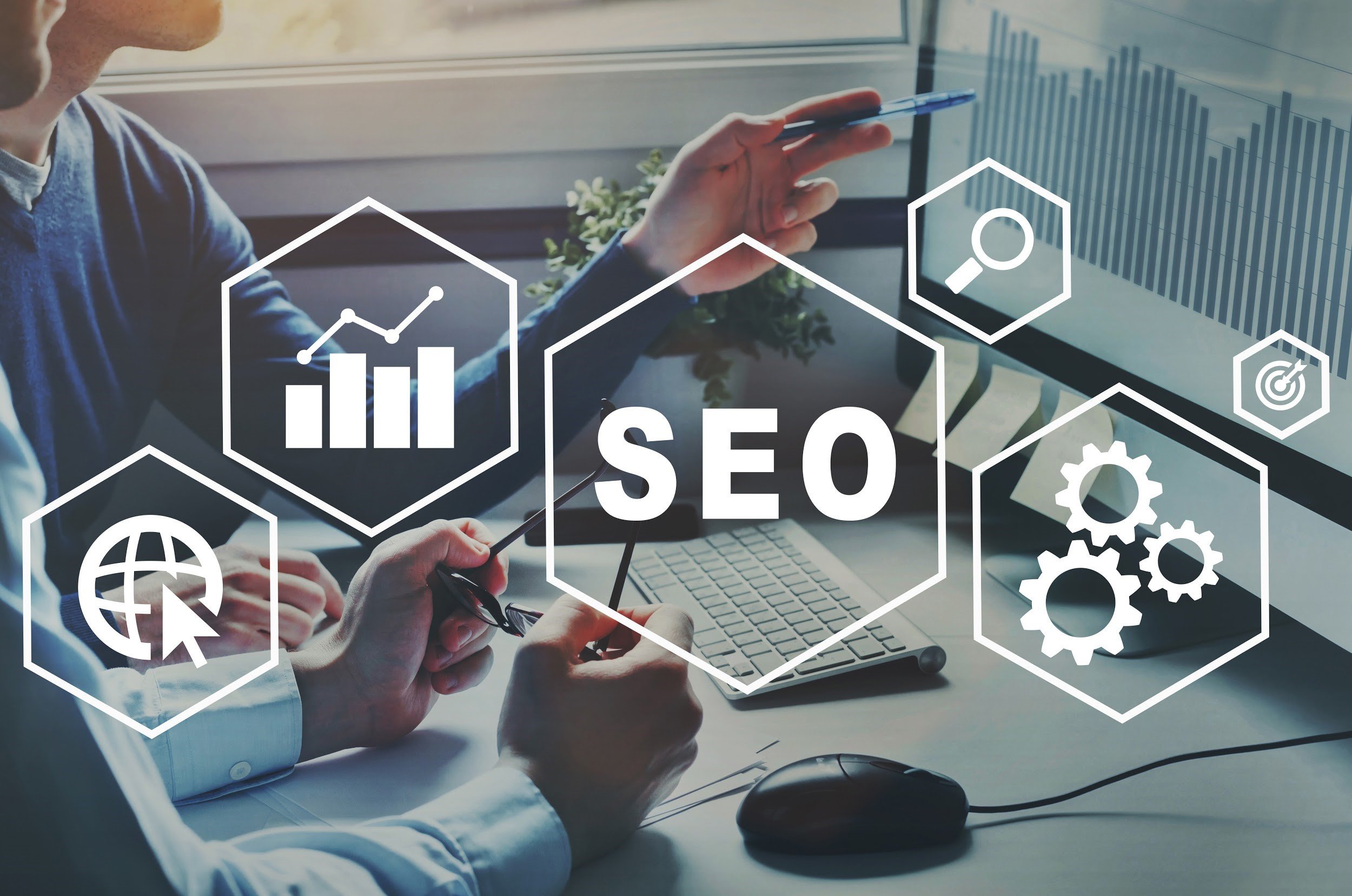 business people working on SEO on a computer