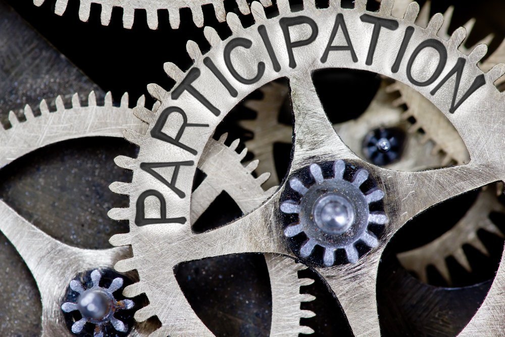 Photo of wheel mechanism with participation concept letters