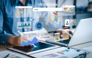 Person on computer analyzing marketing data