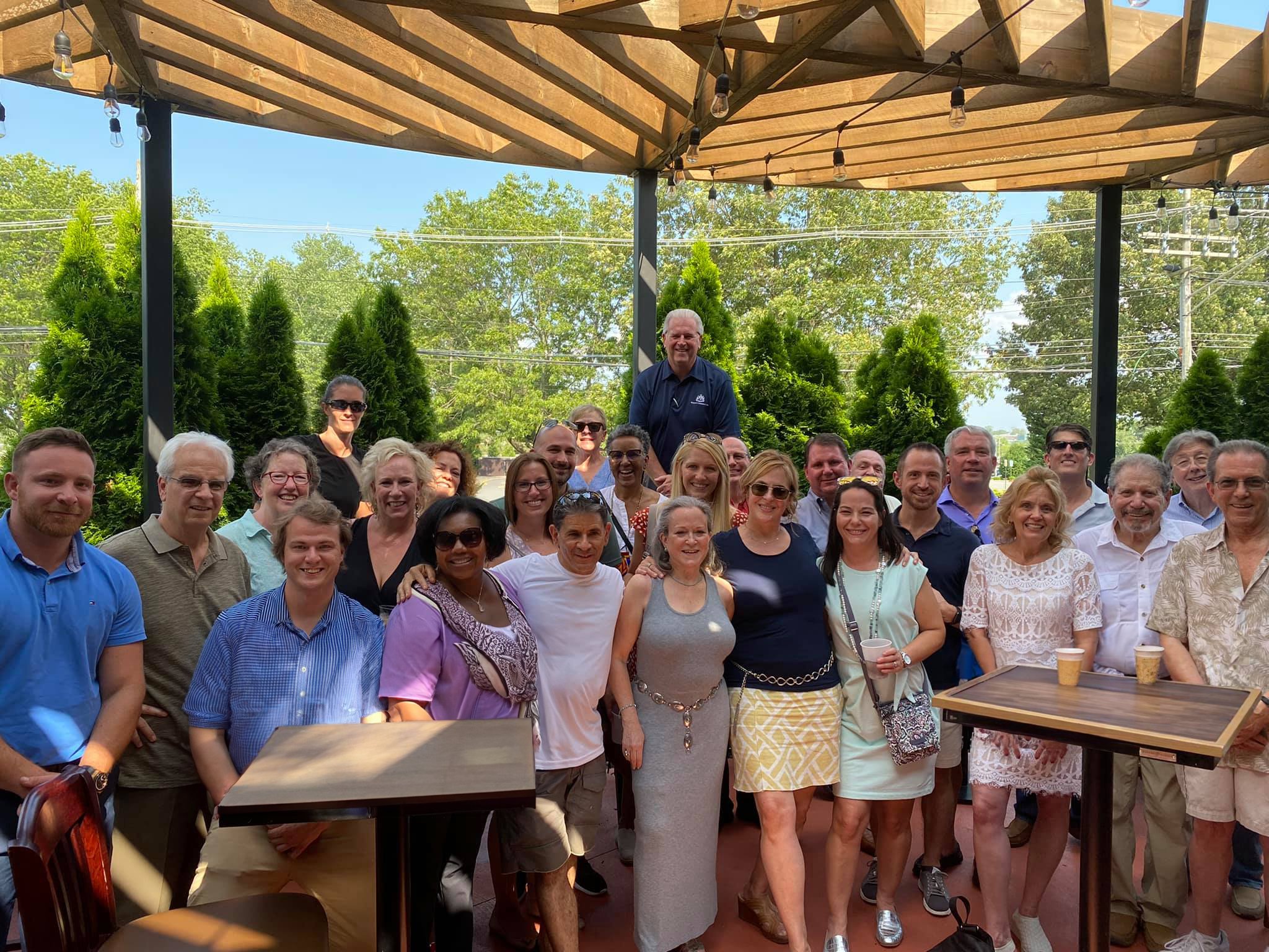 Outdoor networking event at restaurant