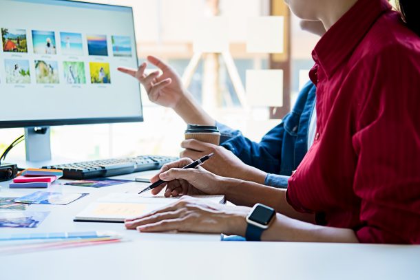Team working on small business content calendar