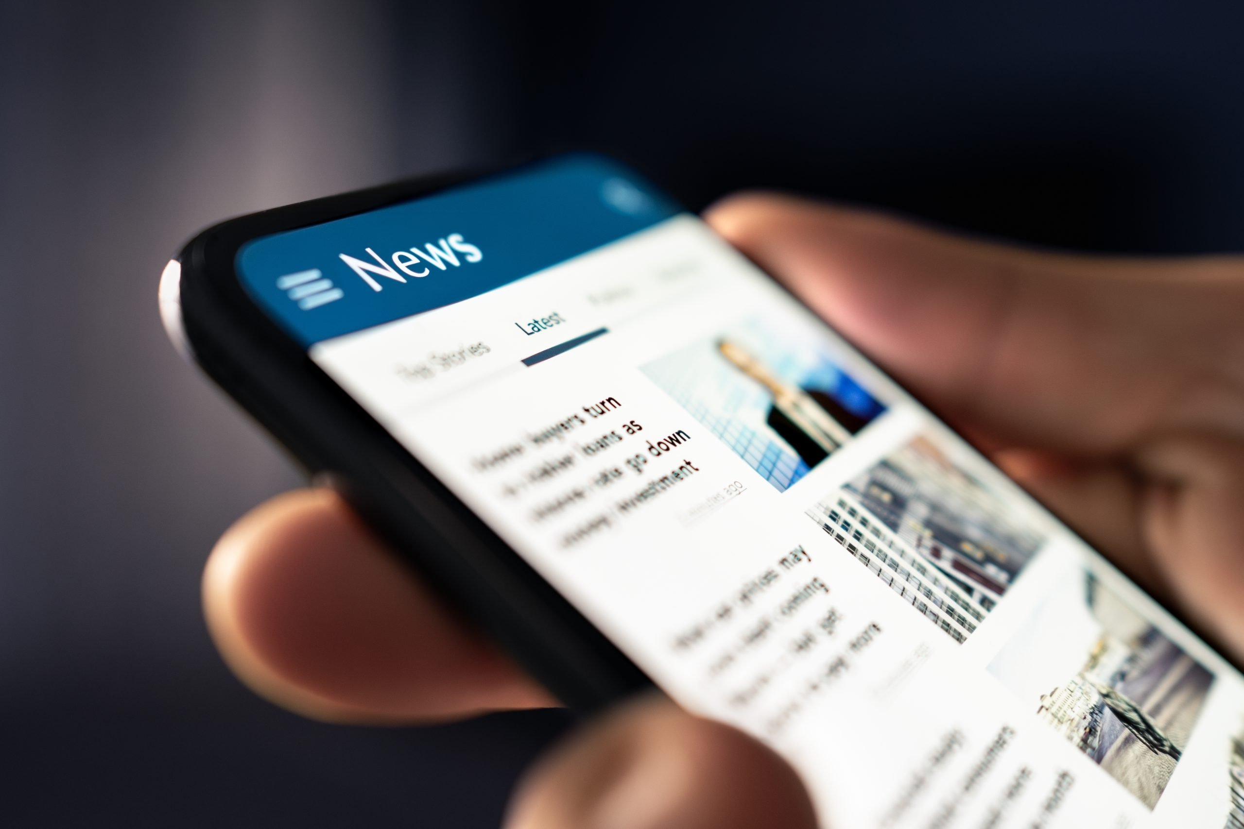 News outlet on mobile phone